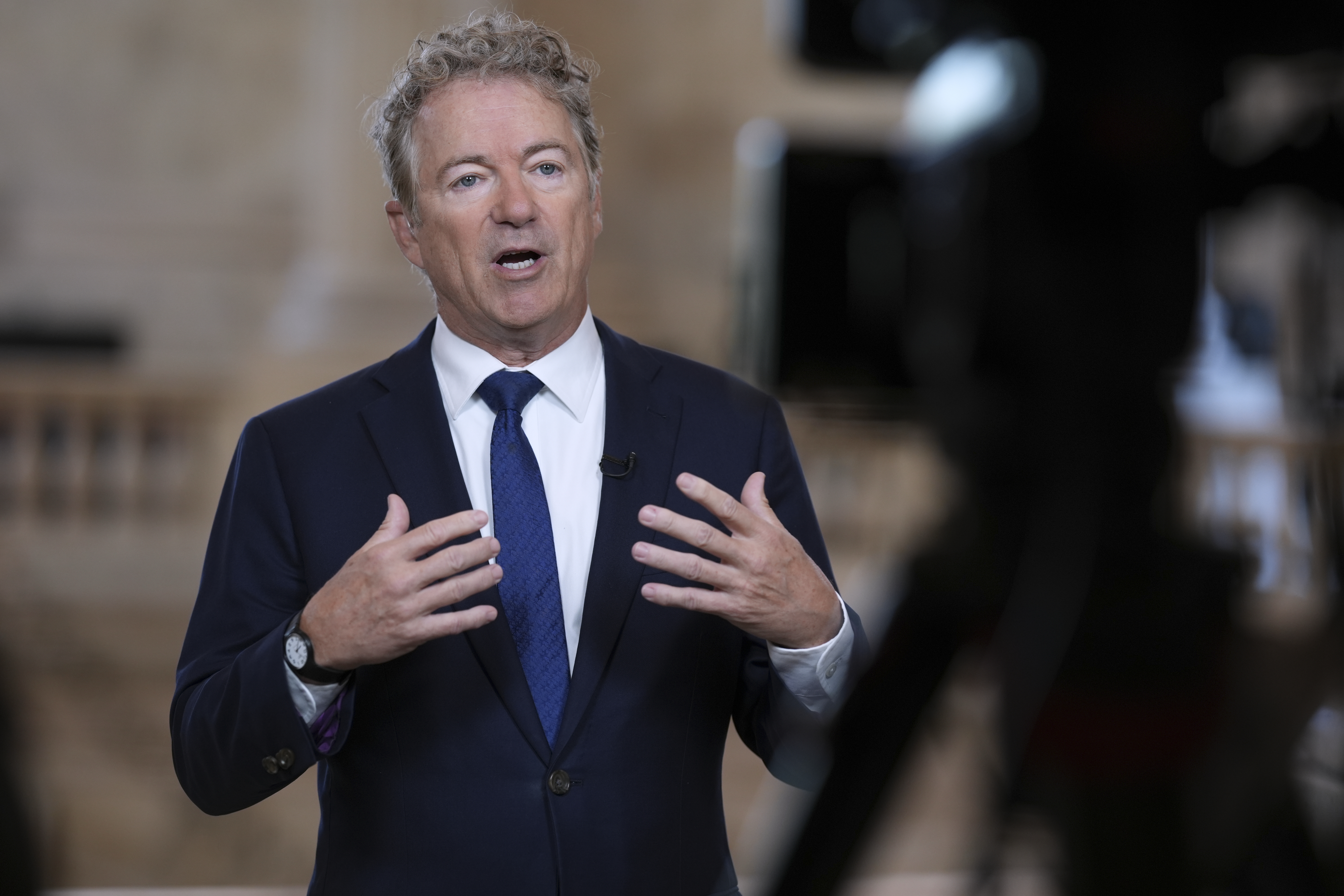As Senate Republicans work to advance President Donald Trump&#039;s spending and tax bill, Sen. Rand Paul, R-Ky., who is opposed to the reconciliation package because of the debt-limit increase, does a TV news interview at the Capitol in Washington, Tuesday, June 3, 2025.<br /> (J. Scott Applewhite / AP Photo)