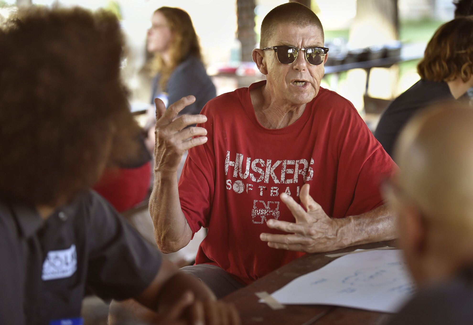 Shawn Fauver talks about his own experience with the Section 8 housing voucher program during a meeting of housing advocates in Lincoln’s Cooper Park in late June. “Section 8 saved me,&quot; Fauver said.<br />(Eric Gregory / Flatwater Free Press)