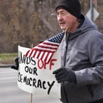 Some of the many signs held by protestors at Memorial Park in Omaha, Nebraska on April 5th for the “hands off” rally.
(Carla Chance / The Daily Record)