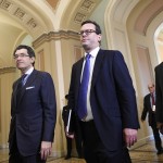 House Democrat attorneys Norm Eisen (left) and Barry Berke (center) arrive on the Senate side of Capitol Hill in Washington, Monday, Feb. 3, 2020, for the impeachment trial of President Donald Trump. 
(Susan Walsh / AP Photo)