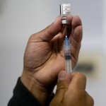 A healthcare worker prepares a shot of the Pfizer COVID-19 vaccine in La Paz, Bolivia, Jan. 7, 2025. 
(Juan Karita / AP Photo)