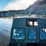 Tristen Pattee hunts with his family along the Kobuk River near Ambler, Alaska, where heavy rains have contributed to riverbank erosion Tuesday, Sept. 30, 2025. 
(Annika Hammerschlag / AP Photo)