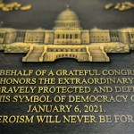 A replica plaque commemorating the Jan. 6, 2021 Capitol riot hangs outside the office of Speaker Emerita Nancy Pelosi, D-Calif., Tuesday, Dec. 30, 2025, at the Longworth House Office Building on Capitol Hill in Washington.
(Julia Demaree Nikhinson / AP Photo)