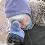 A protester covers their eyes after confronting law enforcement outside the Bishop Henry Whipple Federal Building, Thursday, Jan. 8, 2026, in Minneapolis, Minn. 
(Tom Baker / AP Photo)