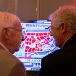 State Sen. Merv Riepe of Ralston and Fletcher Reel of Omaha discuss election results for Pennsylvania at the Nebraska GOP watch party in Bellevue on Nov. 5, 2024. 
(Marissa Lindemann / Nebraska News Service)
