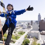 Sister Stephanie Matcha, 81, raised more than $3,000 as part of a fundraiser to support the Siena Francis House when she rappelled down the side of The Highline Apartments in downtown Omaha on May 3. 
(Anna Reed / Flatwater Free Press)
