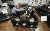 Tommy Tate opens the hood of a 1946 Rolls-Royce Silver Wraith during an interview at The Rolls-Royce Foundation in Mechanicsburg, Pa., Saturday, April 5, 2025. 
(Matt Rourke / AP Photo)
