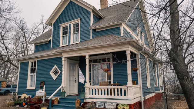 Built in 1869, the house that Tim Reeder is preserving was one of 12 identical duplexes constructed on a hill overlooking the parade grounds at Fort Omaha. Thirty-one years later, two brothers bought it and moved it in two pieces to 6327 Florence Blvd. in Omaha. 
(Abiola Kosoko / Flatwater Free Press)