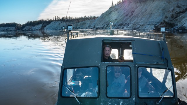 Tristen Pattee hunts with his family along the Kobuk River near Ambler, Alaska, where heavy rains have contributed to riverbank erosion Tuesday, Sept. 30, 2025. 
(Annika Hammerschlag / AP Photo)