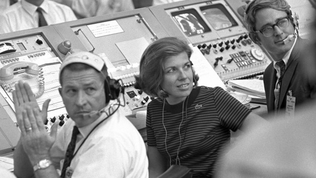 In this photo provided by NASA, JoAnn Morgan watches the launch of Apollo 11 from the launch firing room, July 16, 1969, in Cape Canaveral, Fla. 
(NASA via AP)