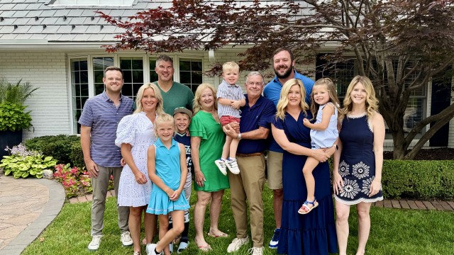 Although Attorney Michael Mullin (center) has received numerous honors and recognitions throughout his legal career, he said he is most proud of his family, which includes wife, Joani, just celebrating their 42nd anniversary, four children and four grandchildren.
(Courtesy Photo)