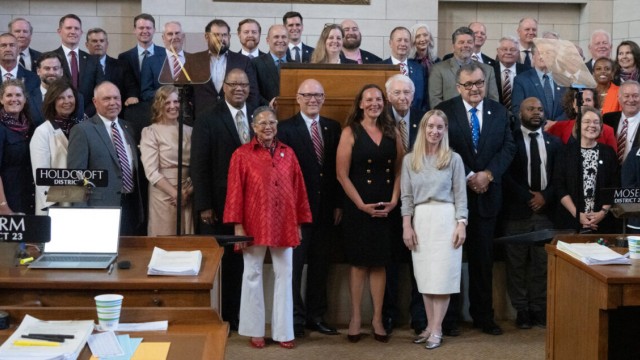State senators join together after adjourning for the year at the end of the 2025 legislative session. Not pictured: State Sens. Christy Armendariz of Omaha, Myron Dorn of Adams, Rob Dover of Norfolk and Glen Meyer of Pender, June 2, 2025. 
(Zach Wendling / Nebraska Examiner)