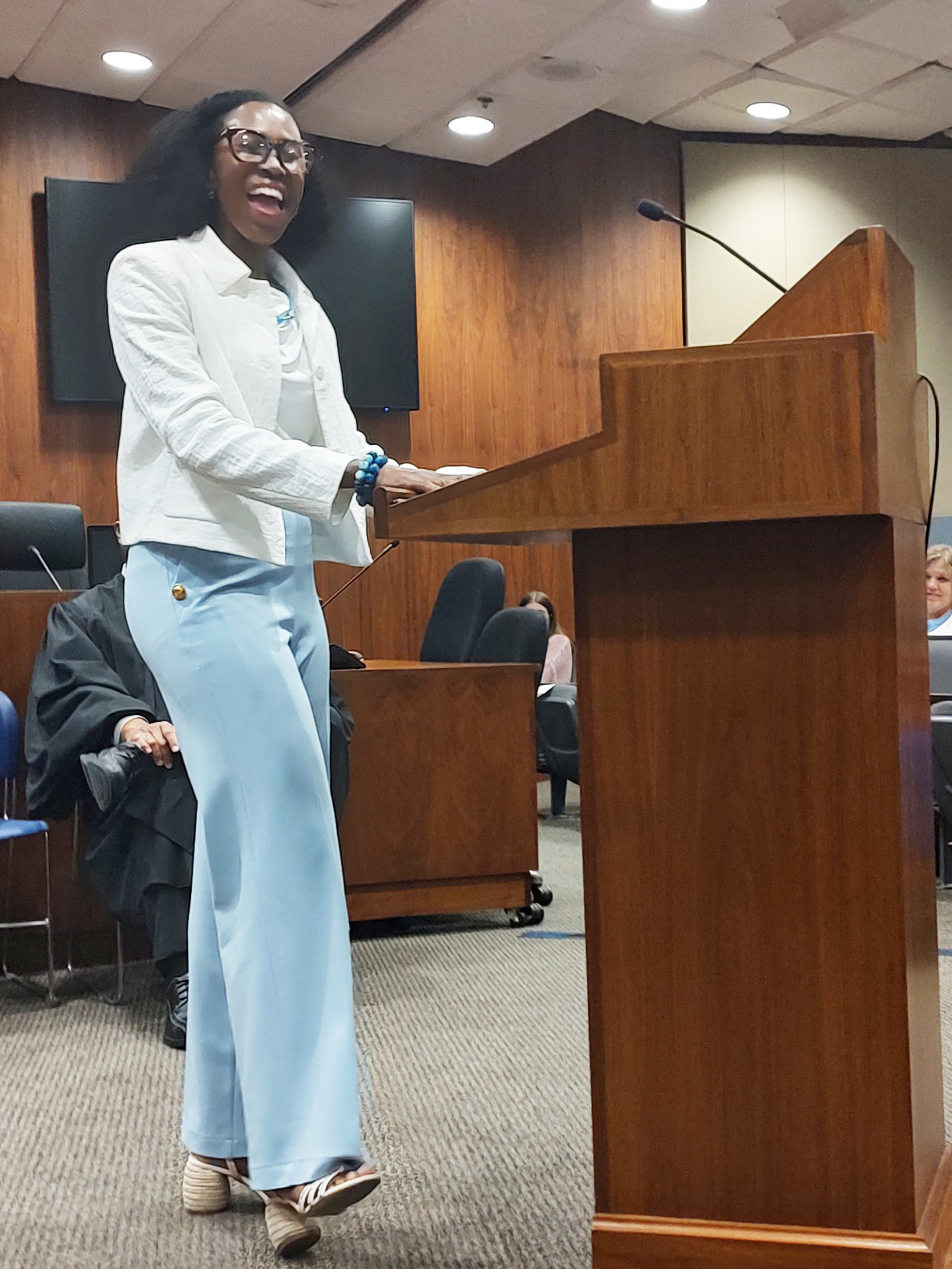 Long time friend of the inductee, New York attorney Charmaine Brooks, esq. giving pleasant advice for the new judge while recounting stories of preparing for marathons.<br />(Austin Petak / The Daily Record)