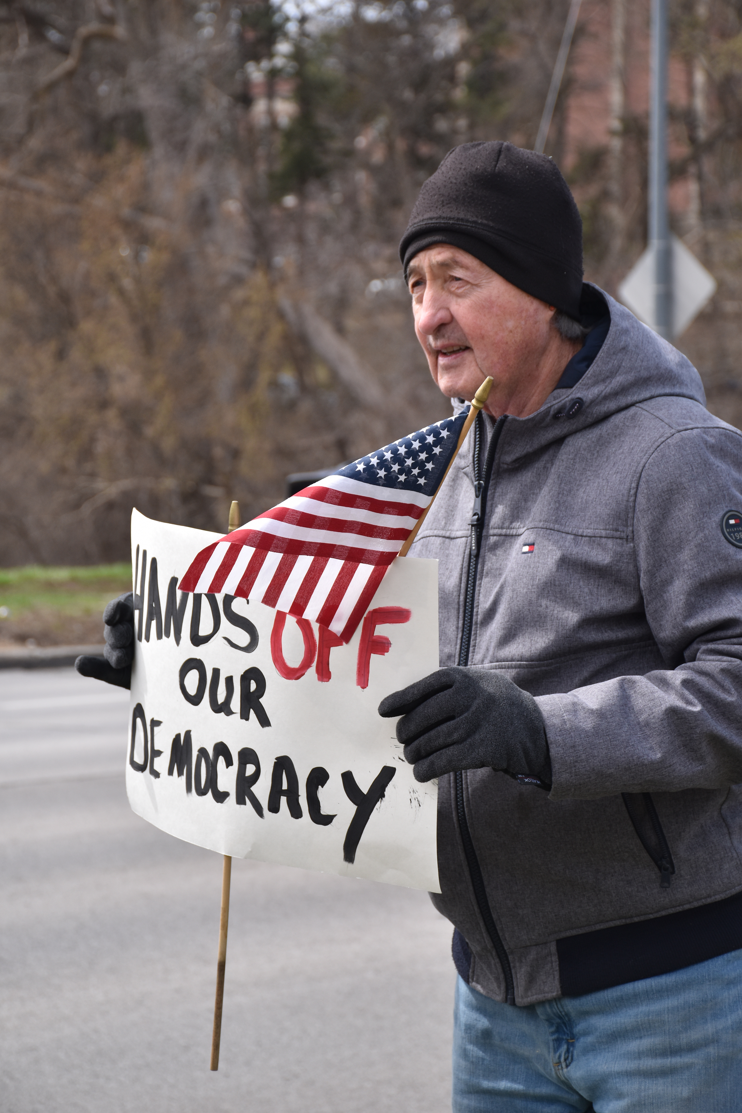 Some of the many signs held by protestors at Memorial Park in Omaha, Nebraska on April 5th for the “hands off” rally.<br />(Carla Chance / The Daily Record)
