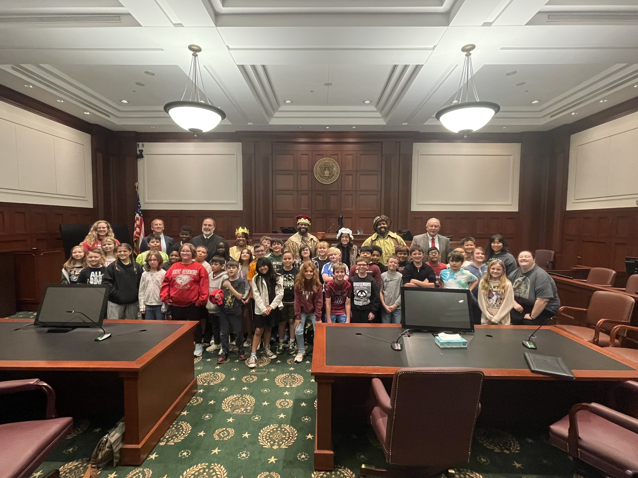 Students from Paddock Road Elementary School pose with actors and legal professionals taking part in the 2025 Law Day mock trial at the Roman Hruska Federal Courthouse in Omaha.<br />(Courtesy of Dave Sommers)