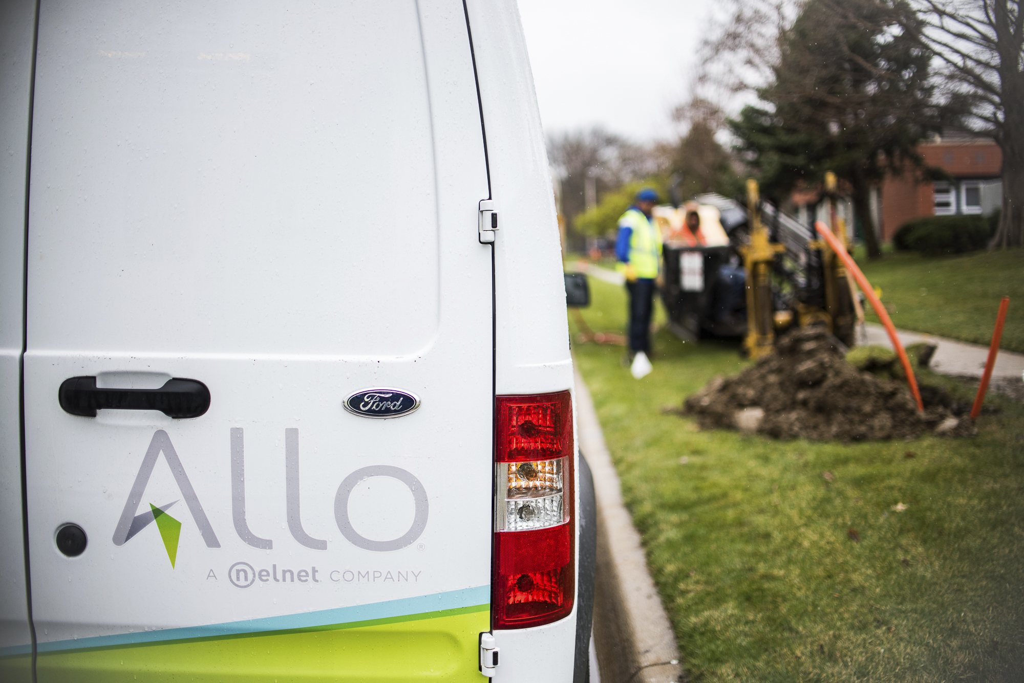 In this April 1, 2016 photo, Allo Communications crews install fiber-optic cables on Eastridge Drive in Lincoln, Nebraska to provide high-speed internet citywide.<br />(Mischa Lopiano / The Journal-Star via AP)