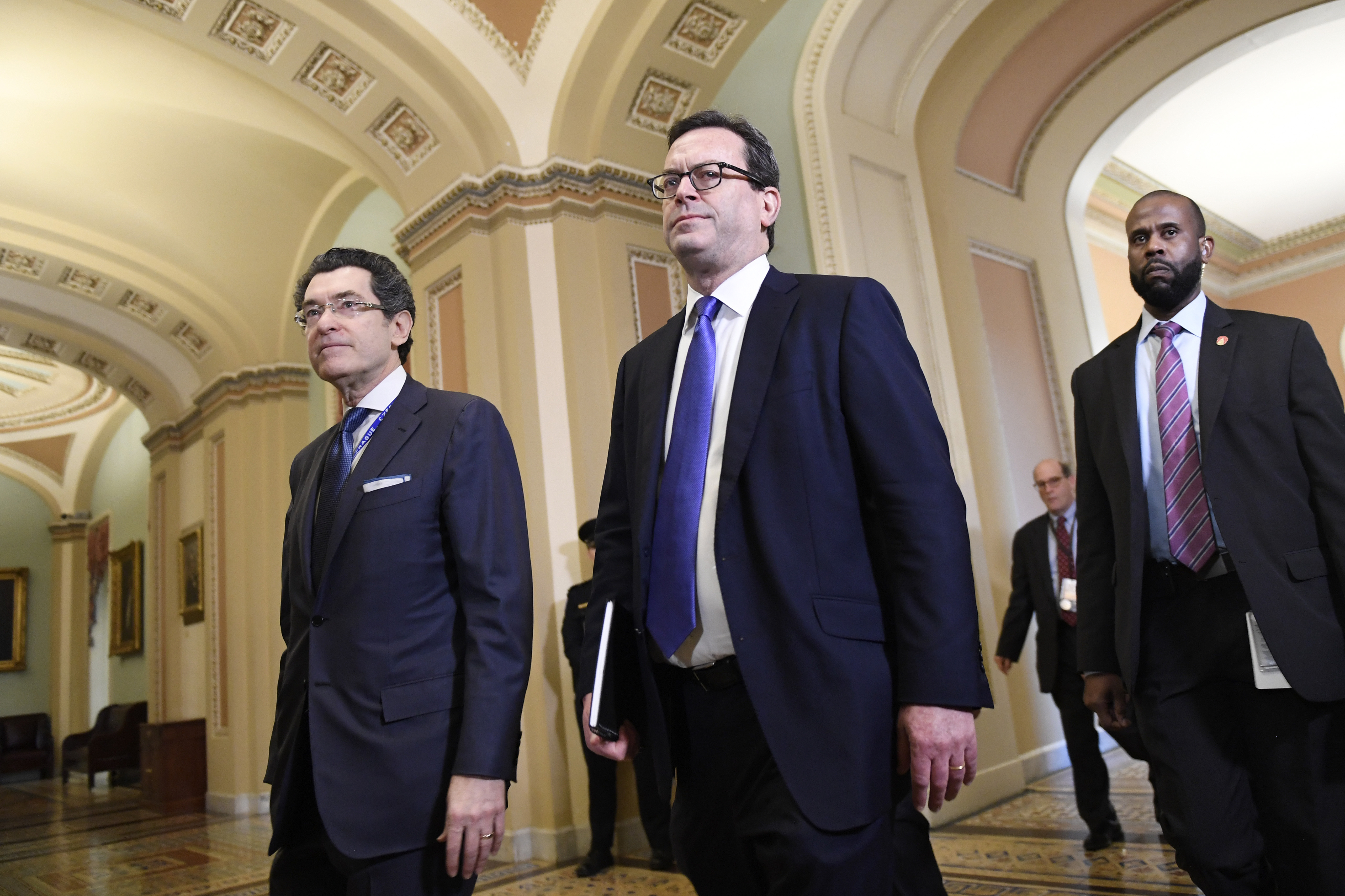 House Democrat attorneys Norm Eisen (left) and Barry Berke (center) arrive on the Senate side of Capitol Hill in Washington, Monday, Feb. 3, 2020, for the impeachment trial of President Donald Trump.<br />(Susan Walsh / AP Photo)