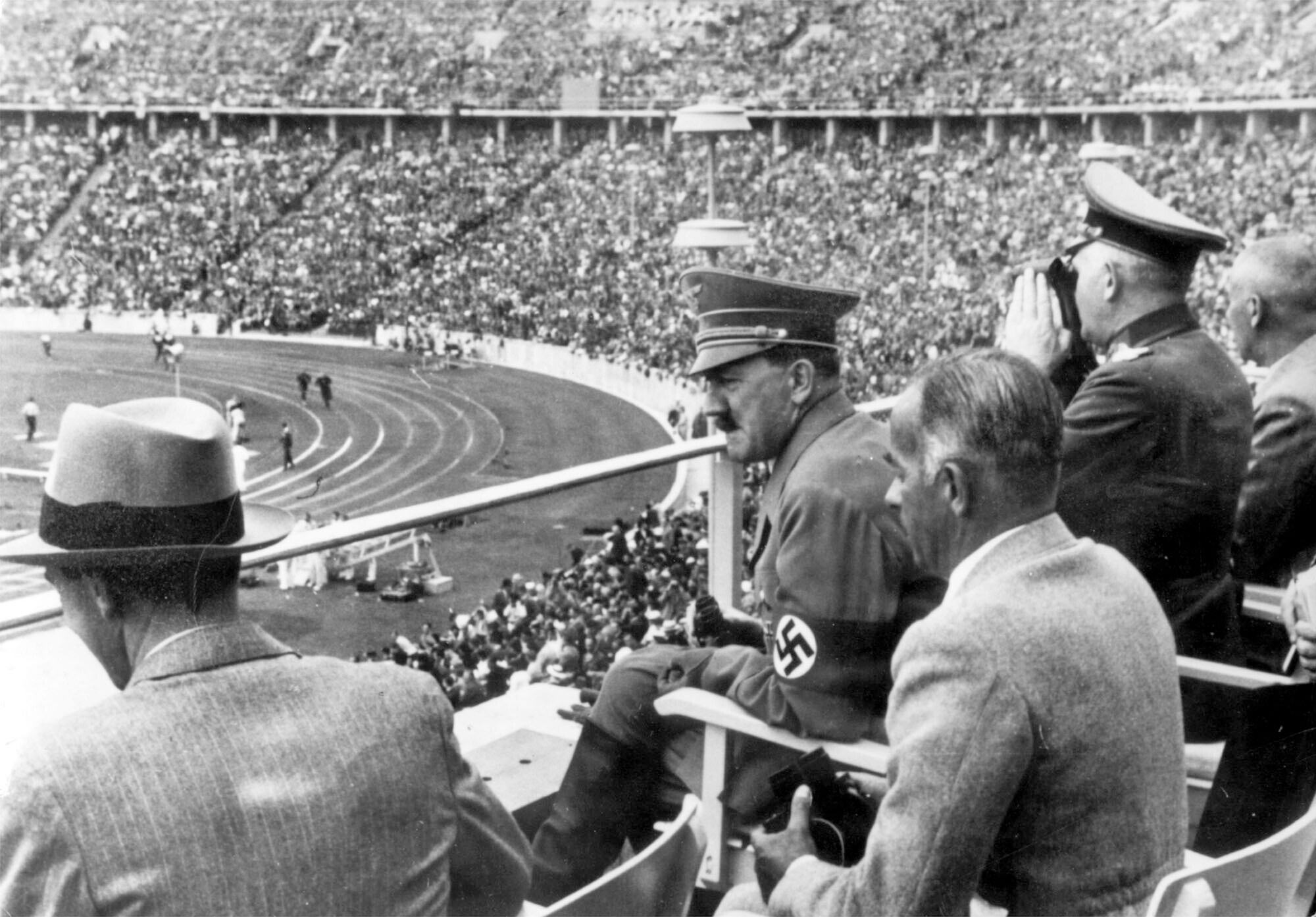 From left to right, Dr. Joseph Goebbels, German Chancellor Adolf Hitler, Reichs Sports Leader Hans von Tschammer und Osten and General Field Marschall Werner von Blomberg observe the Olympic Games in Berlin, Germany in August 1936.<br />(AP Photo, File)