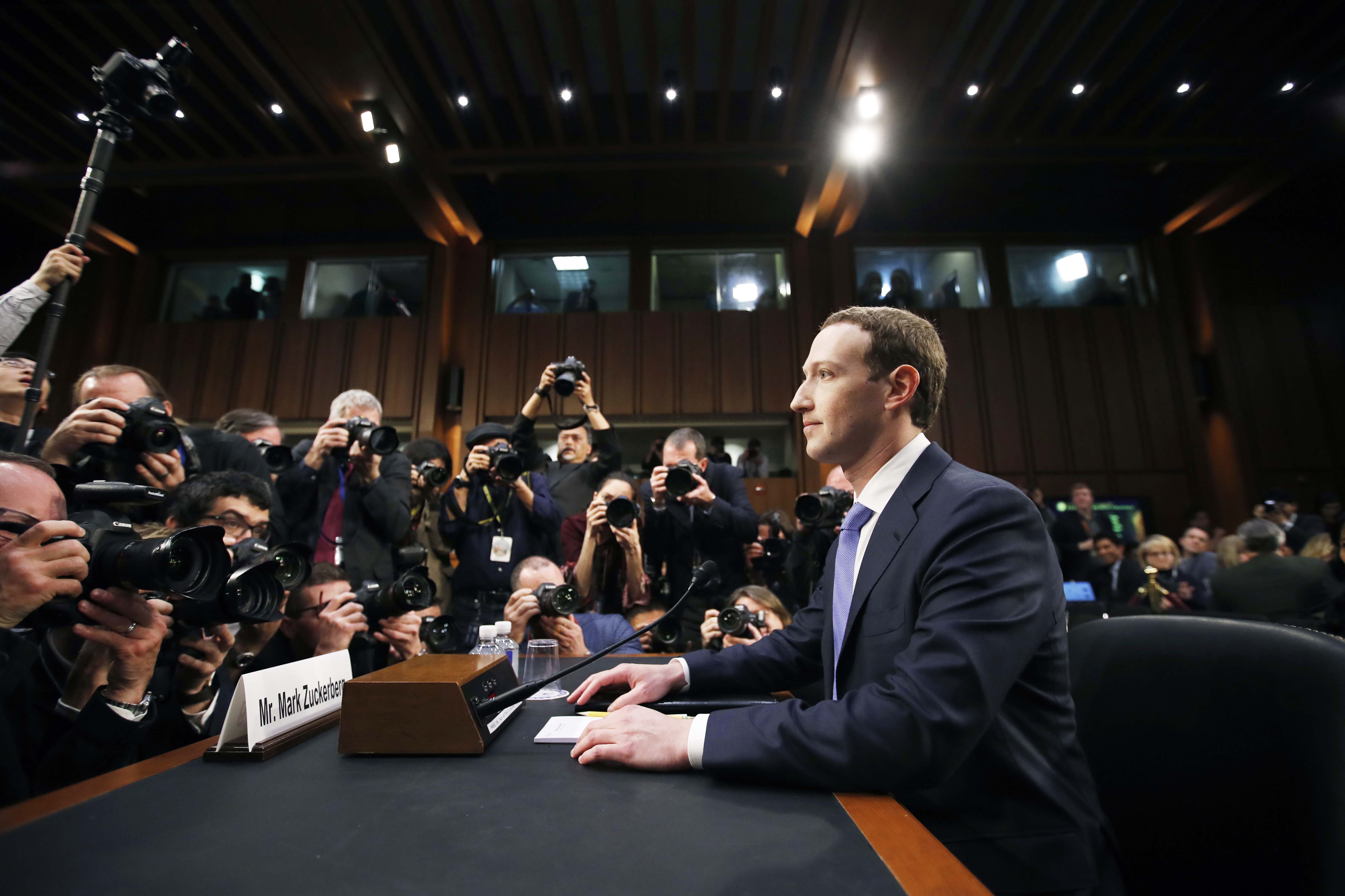 Facebook CEO Mark Zuckerberg takes his seat to testify before a joint hearing of the Commerce and Judiciary Committees on Capitol Hill in Washington, April 10, 2018, about the use of Facebook data to target American voters in the 2016 election.<br />(Alex Brandon / AP Photo)