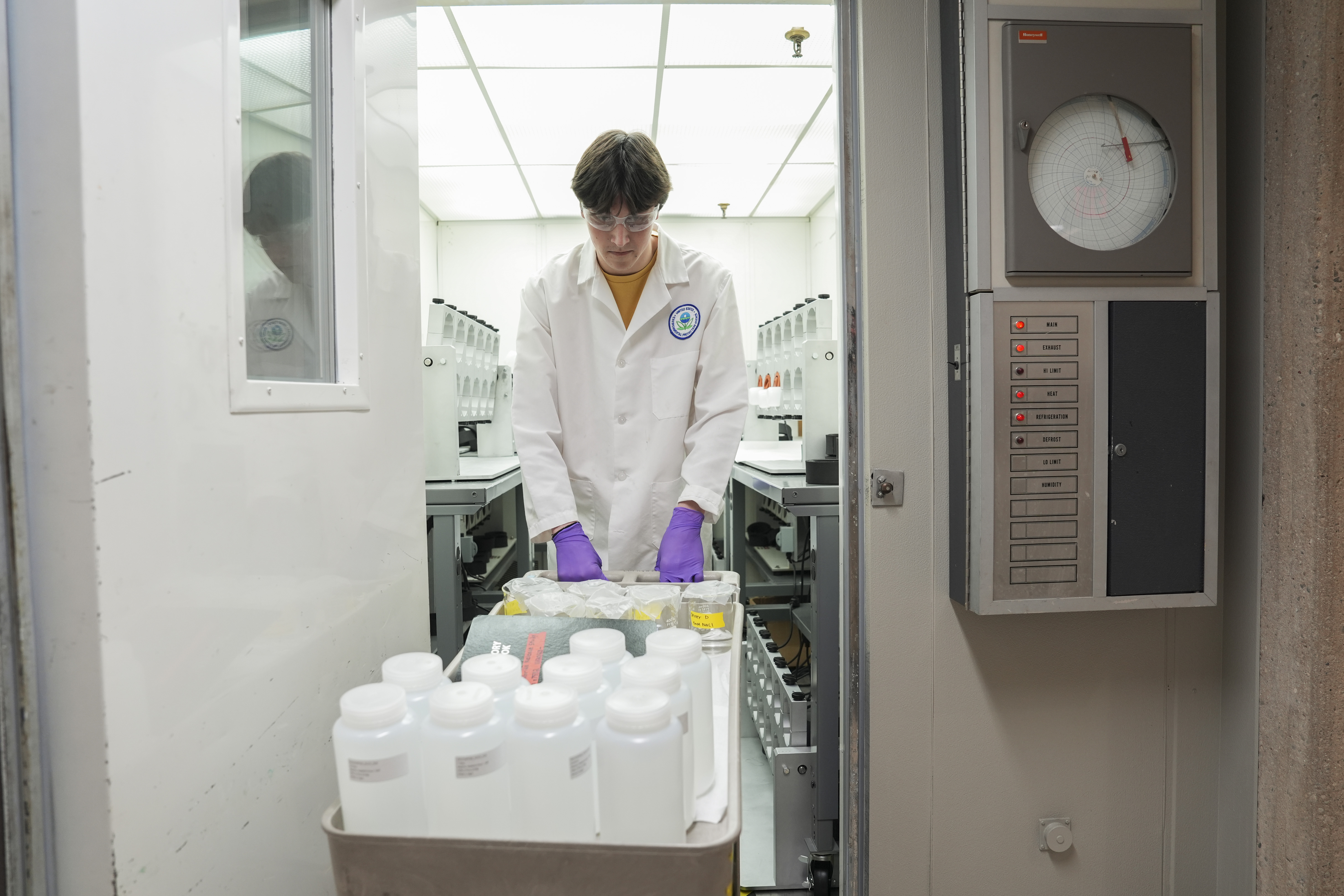 Jackson Quinn brings PFAS water samples into a temperature controlled room, Wednesday, April 10, 2024, at a U.S. Environmental Protection Agency lab in Cincinnati.<br />(Joshua A. Bickel / AP Photo)