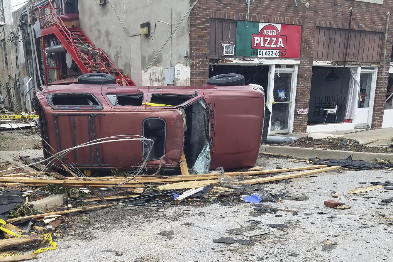 A car lies knocked over on its side after a tornado tore through Sulphur, Okla., Sunday, April 28, 2024.<br />(Ken Miller / AP Photo)