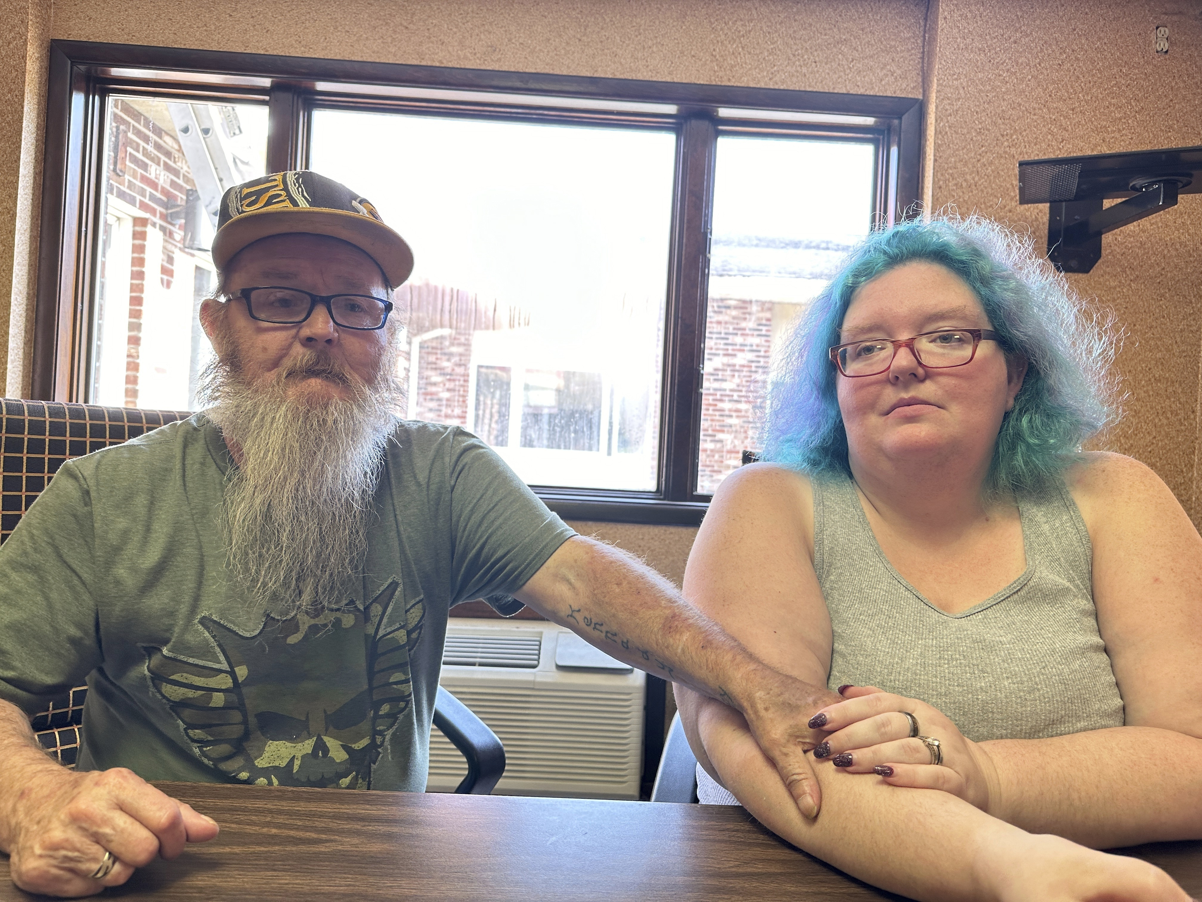 Bruce and Nova Jewett, who are experiencing homelessness, sit at the Hilltop Inn in Berlin, Vt., on Wednesday, Sept. 18, 2024, where they have been living and will have to leave by Oct. 1, 2024.<br />(Lisa Rathke / AP Photo)