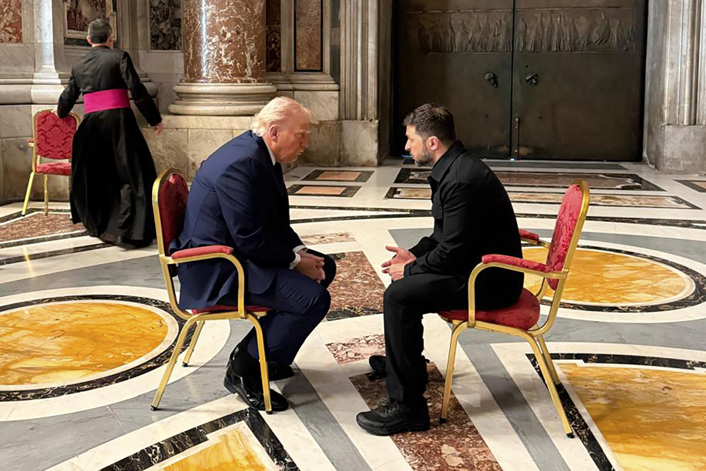 In this photo provided by the Ukrainian Presidential Press Office, Ukraine&#039;s President Volodymyr Zelenskyy (right) and President Donald Trump, talk as they attend the funeral of Pope Francis in Vatican, Saturday, April 26, 2025.<br />(Ukrainian Presidential Press Office via AP)