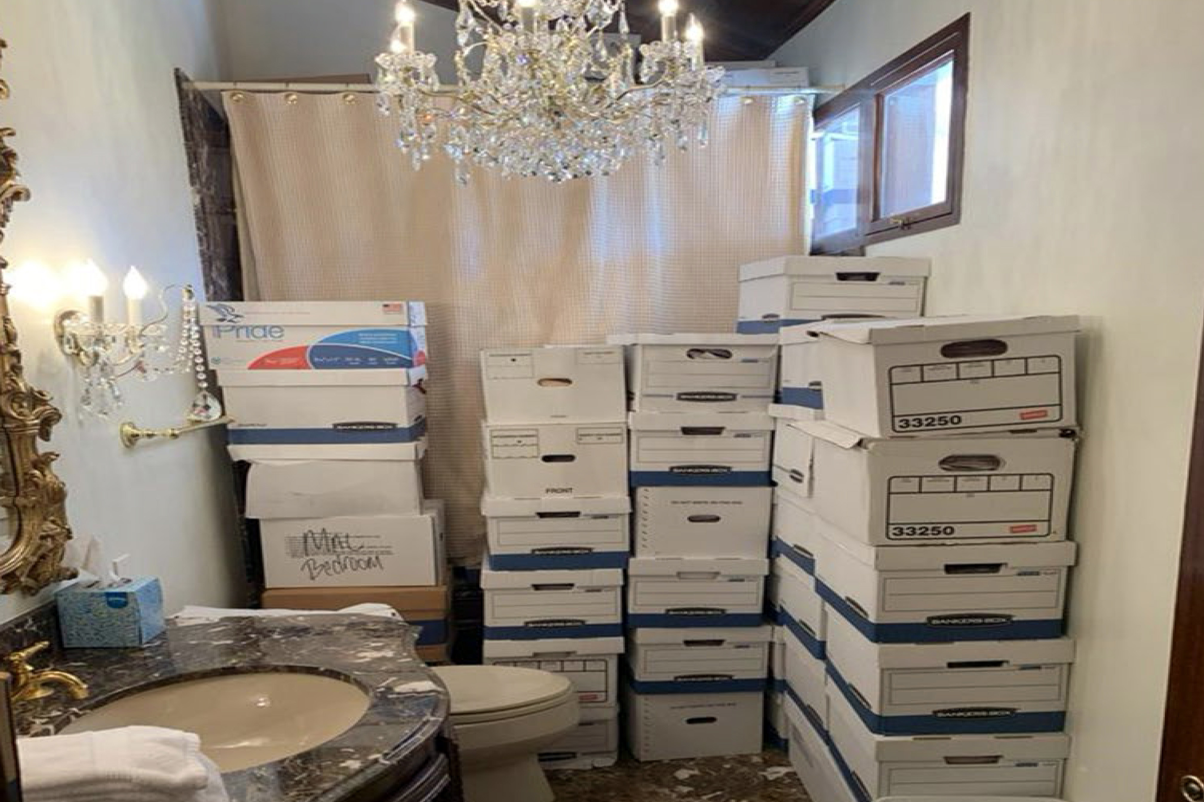 This image, contained in the indictment against President Donald Trump, shows boxes of records stored in a bathroom and shower in the Lake Room at Trump&#039;s Mar-a-Lago estate in Palm Beach, Fla.<br />(Justice Department via AP)
