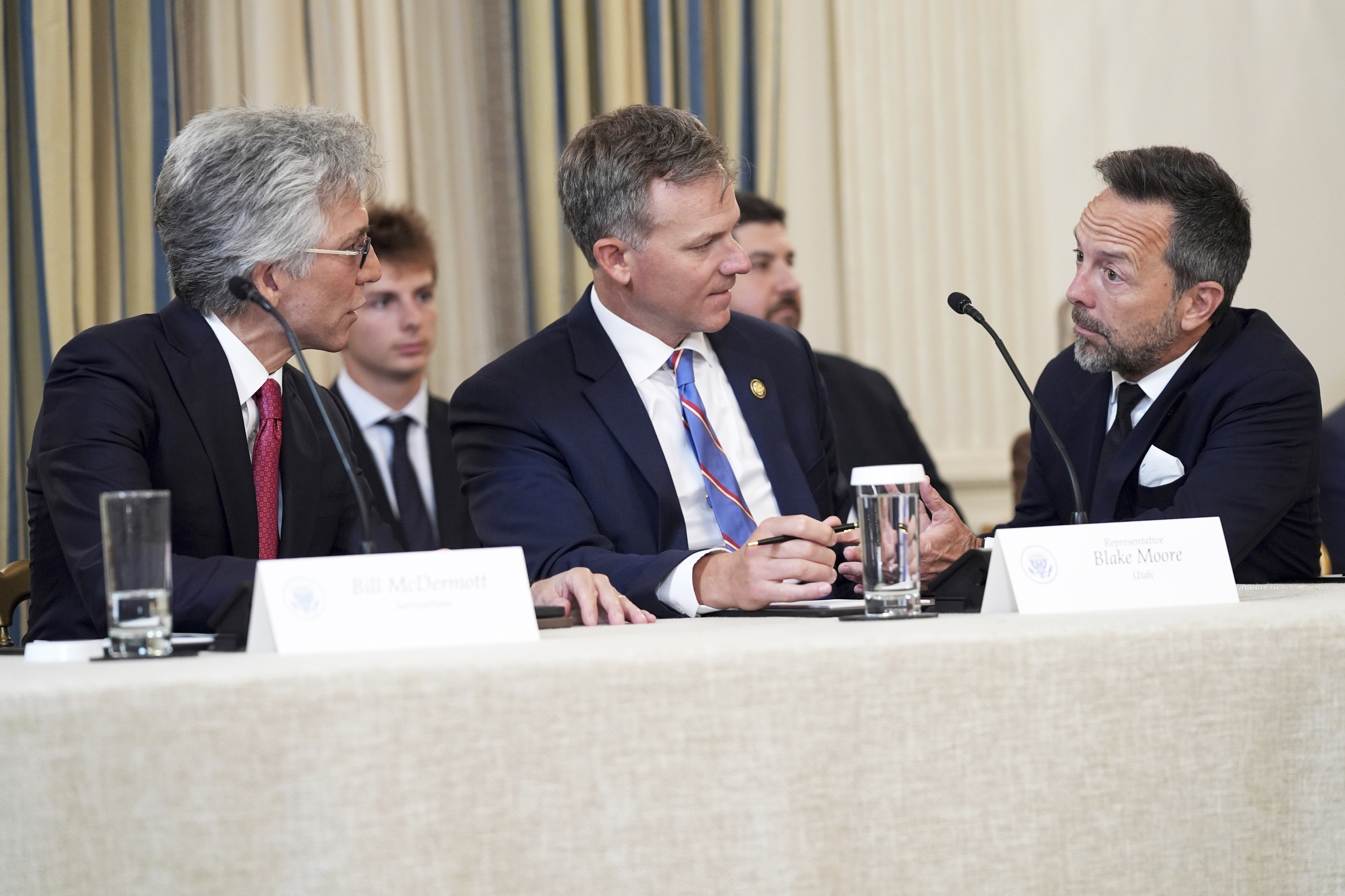 Altimeter CEO Brad Gerstner (from right) speaks with Rep. Blake Moore, R-Utah, and ServiceNow CEO Bill McDermott during an &quot;Invest in America&quot; roundtable with President Donald Trump and business leaders at the White House, Monday, June 9, 2025, in Washington.<br />(Evan Vucci / AP Photo)