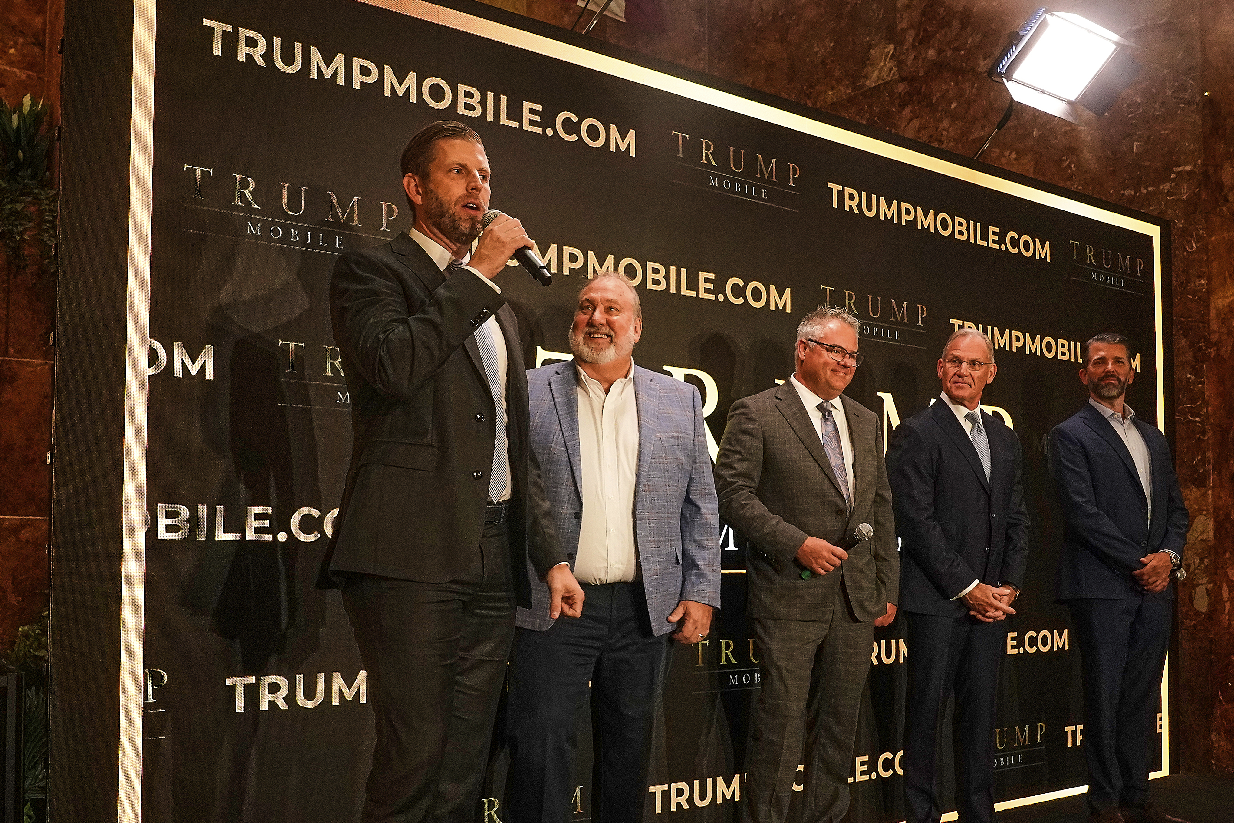 Eric Trump, Don Hendrickson, Eric Thomas, Patrick O&#039;Brien and Donald Trump Jr. (left to right) participate in the announcement of Trump Mobile, in New York&#039;s Trump Tower, Monday, June 16, 2025.<br />(Richard Drew / AP Photo)
