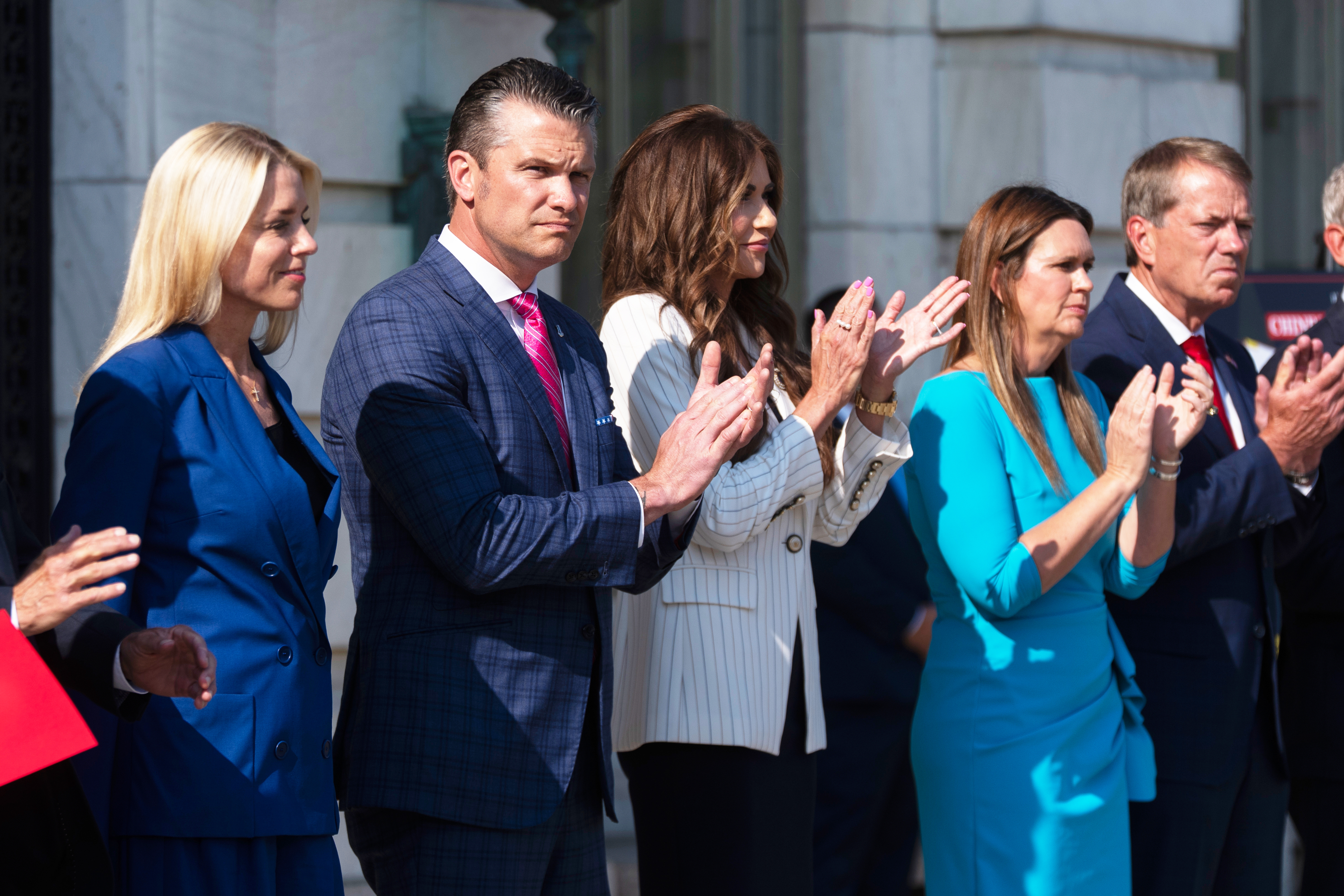 Attorney General Pam Bondi (from left) Secretary of Defense Pete Hegseth, Department of Homeland Security Secretary Kristi Noem, Arkansas Gov. Sarah Huckabee Sanders and Nebraska Gov. Jim Pillen, attend a news conference at the Department of Agriculture to rollout the USDA&#039;S National Farm Security Action Plan, Tuesday, July 8, 2025.<br />(Manuel Balce Ceneta / AP Photo)