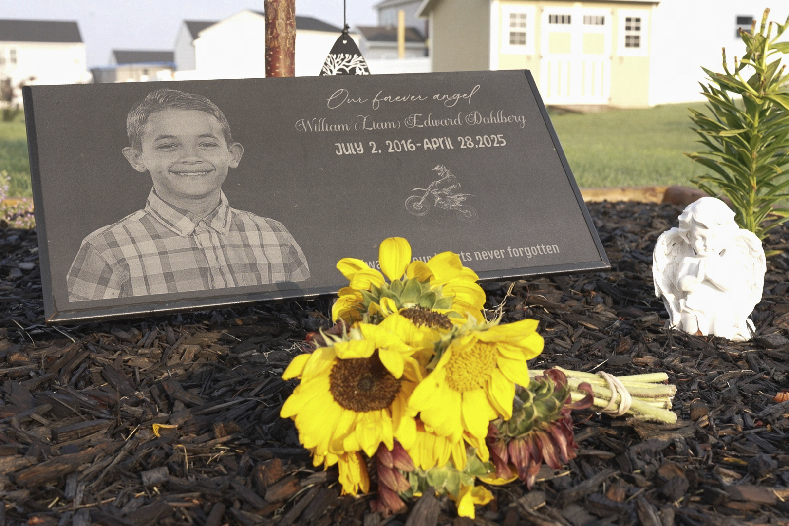 Liam Dahlberg&#039;s memorial sits in his family&#039;s front yard in Lowell, Ind., on Wednesday, Aug. 13, 2025.<br /> (Laura Bargfeld / AP Photo)