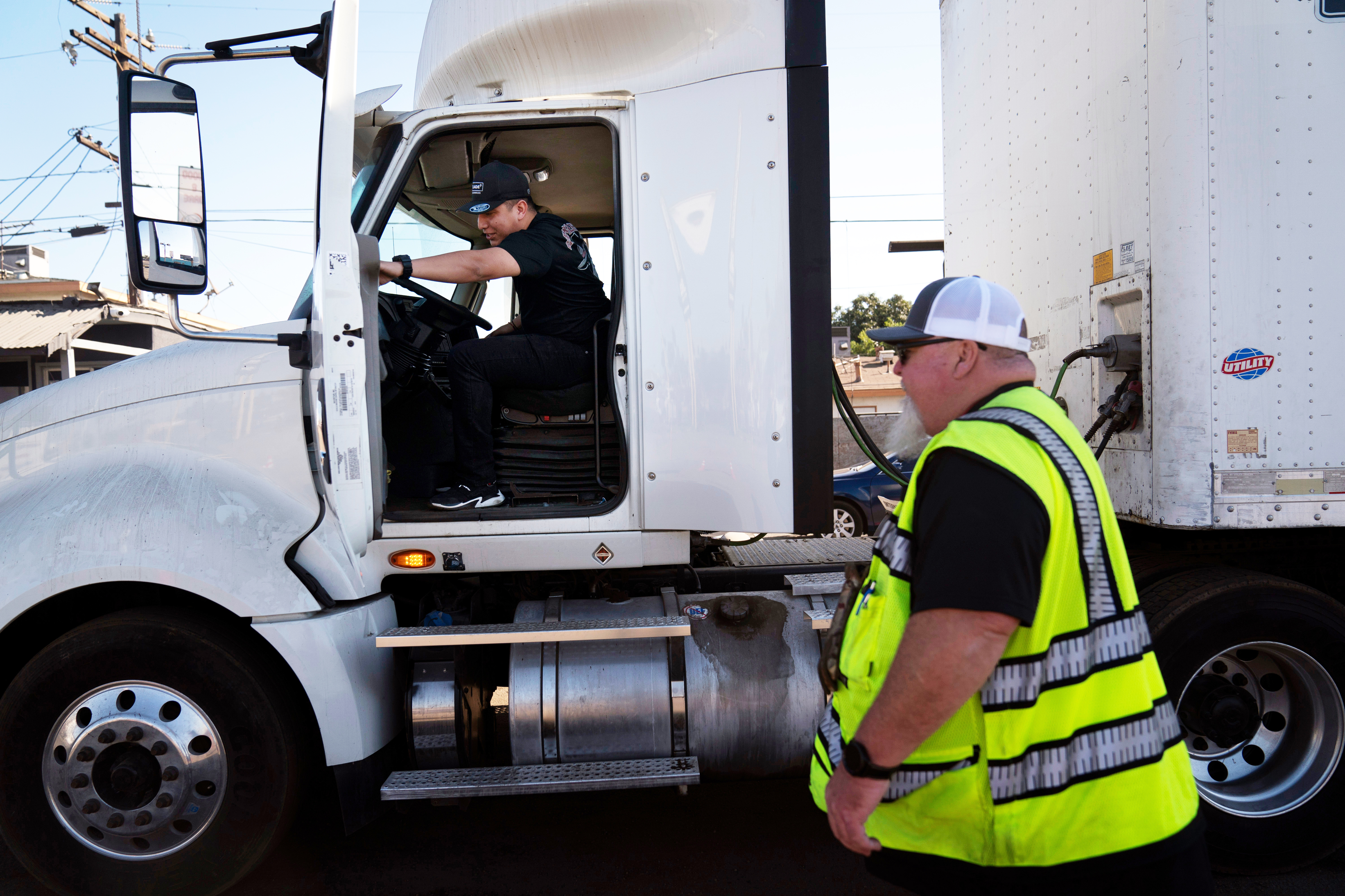 A student driver gets on a truck as the instructor watches in Calif., Nov. 15, 2021.<br />(Jae C. Hong / AP Photo)