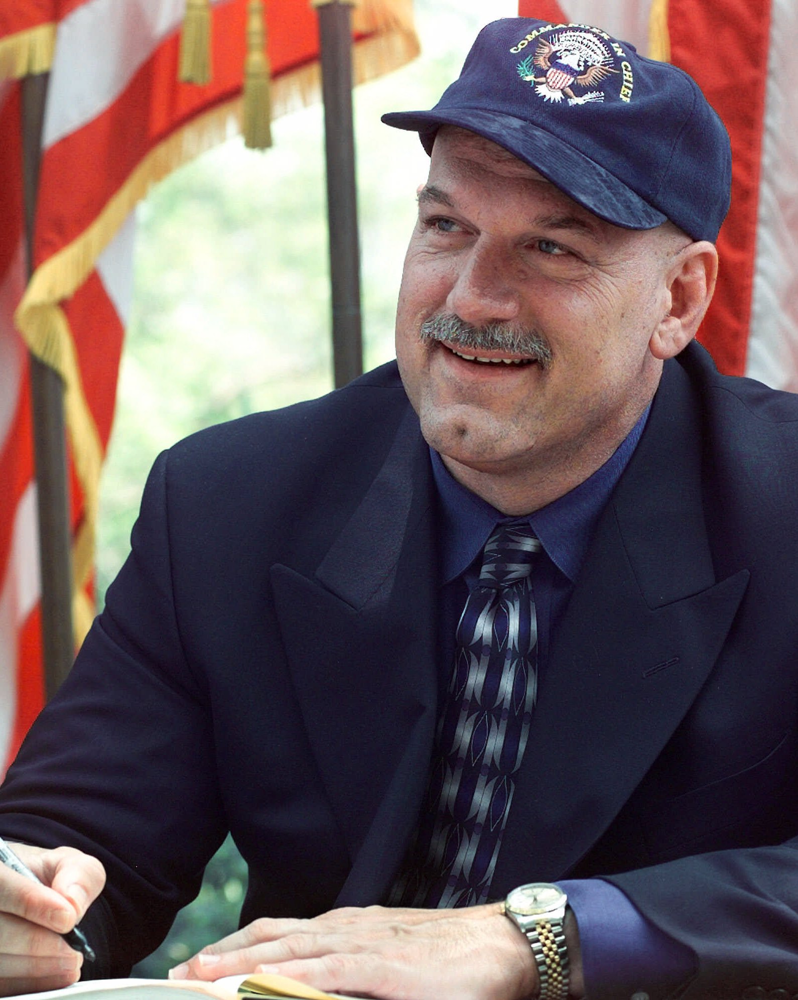 Minnesota Gov. Jesse Ventura smiles as he autographs copies of his book, &quot;I Ain&#039;t Got Time to Bleed: Reworking the Body Politic from the Bottom Up,&quot; at the Richard Nixon Library &amp; Birthplace in Yorba Linda, Calif., Thursday, May 27, 1999.<br />(Kevork Djansezian / AP Photo)