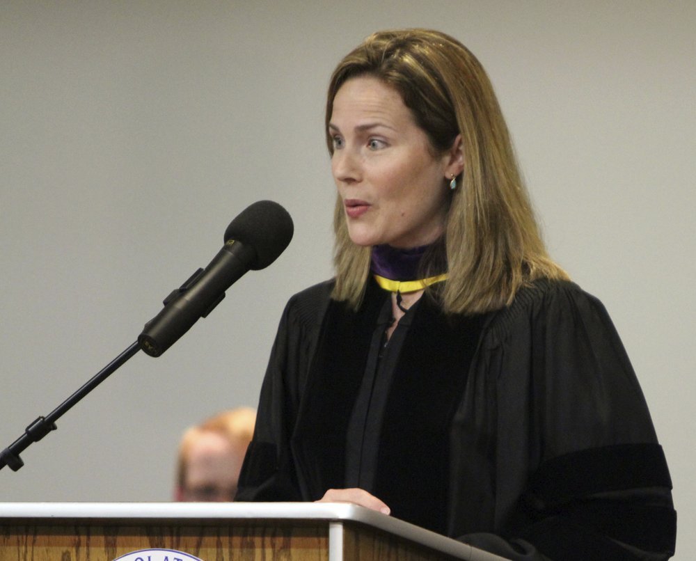 Then-University of Notre Dame law professor Amy Coney Barrett gives the commencement address June 11, 2011, to Trinity at Greenlawn graduates at the Trinity People of Praise Center in South Bend, Ind. (Barbara Allison/South Bend Tribune via AP)