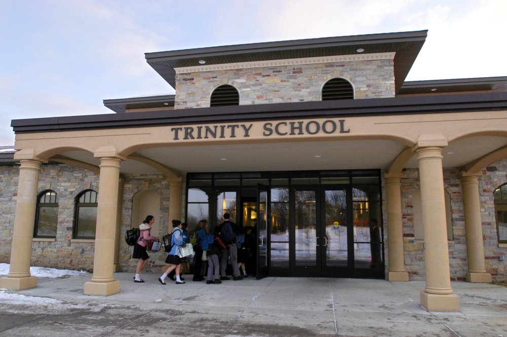 Students head into class at Trinity School at River Ridge’s new campus in Eagan, Minn., Jan. 14, 2008. (Dawn Villella/Pioneer Press via AP)