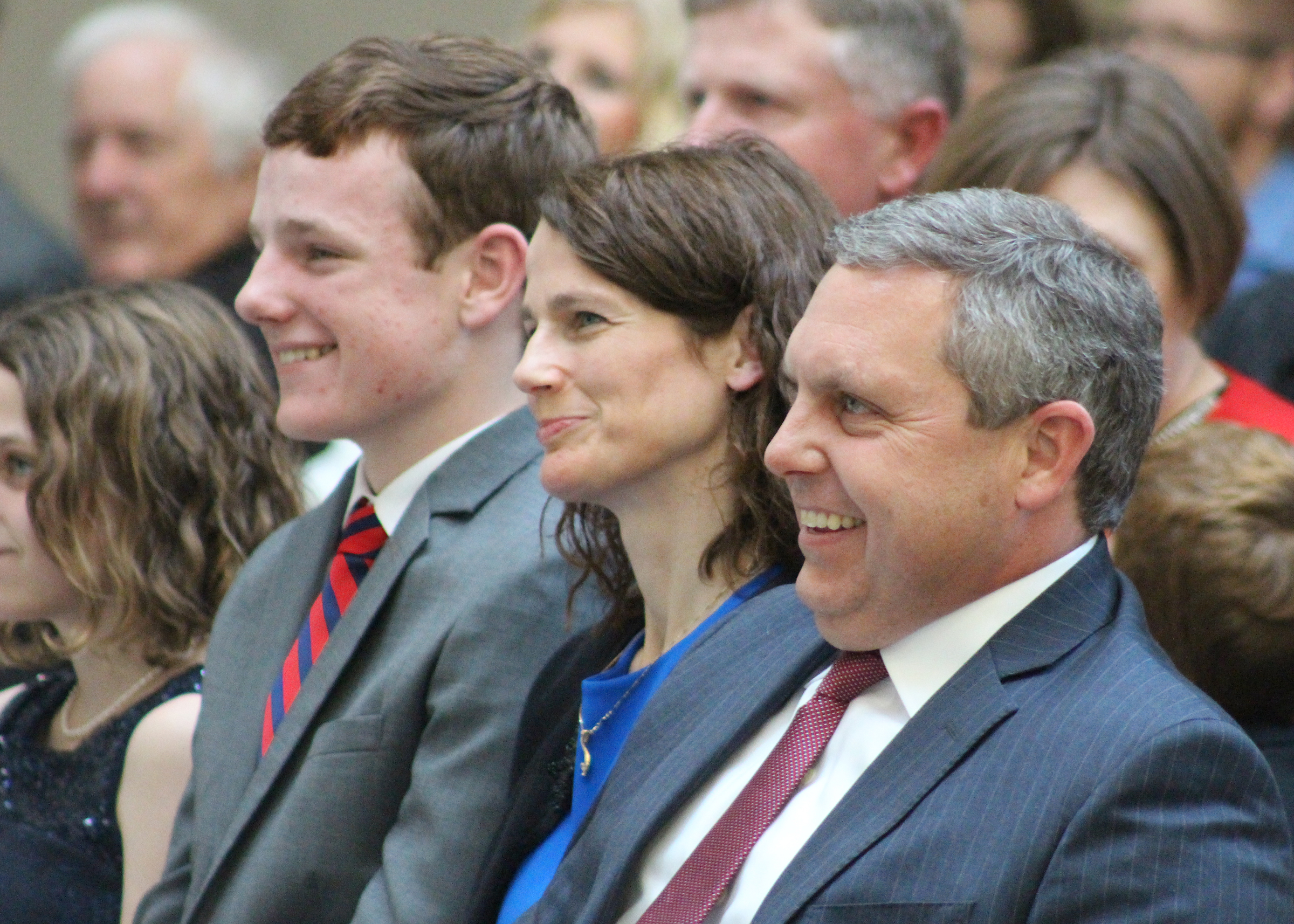 Brian C. Buescher laughs during U.S. Sen. Ben Sasse&#039;s remarks during his investiture ceremony at the Hruska Federal Courthouse on Friday, Nov. 15, 2019. (Photo by Scott Stewart)