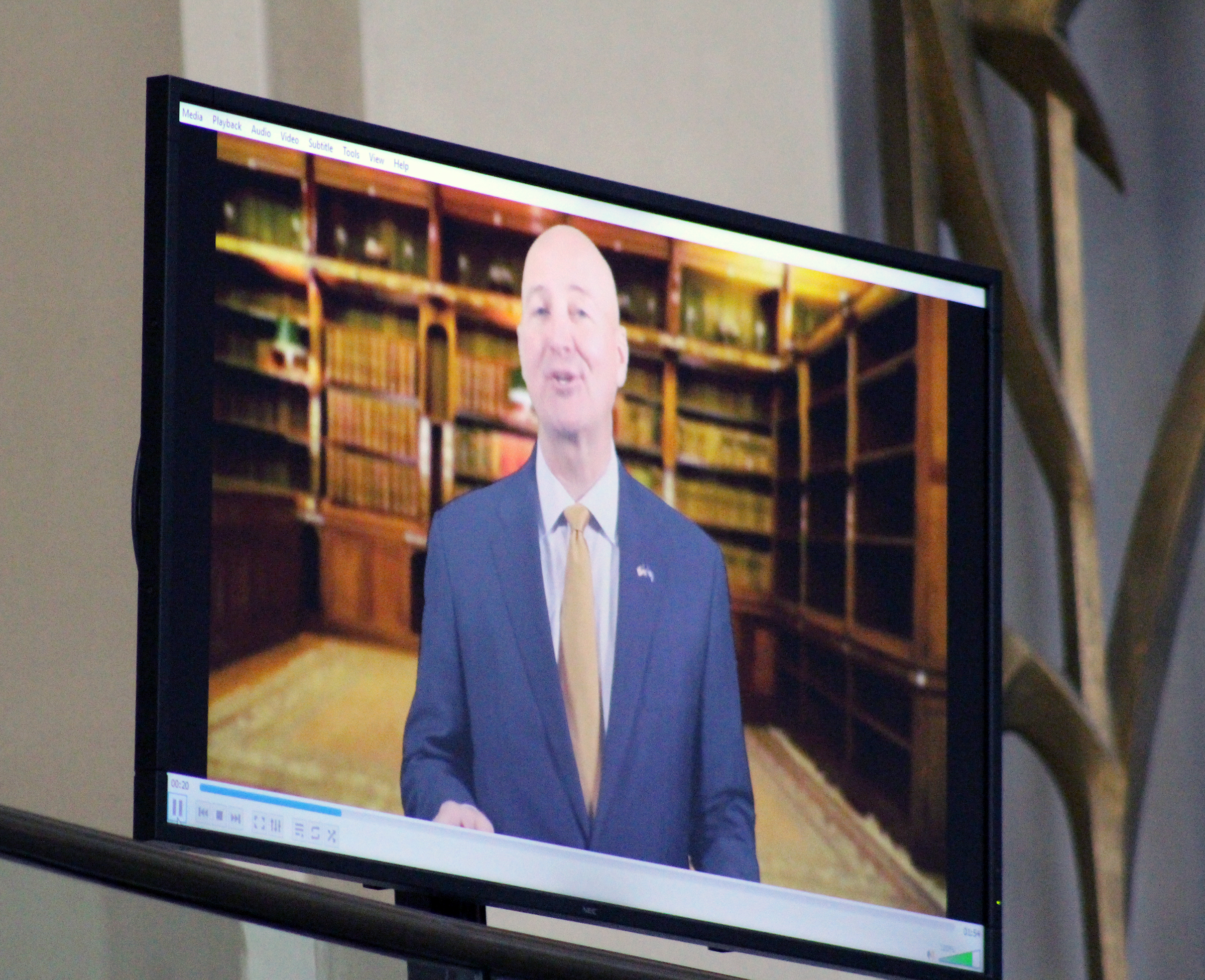 Nebraska Gov. Pete Ricketts delivers remarks by video during Brian C. Buescher&#039;s investiture ceremony at the Hruska Federal Courthouse on Friday, Nov. 15, 2019. (Photo by Scott Stewart)