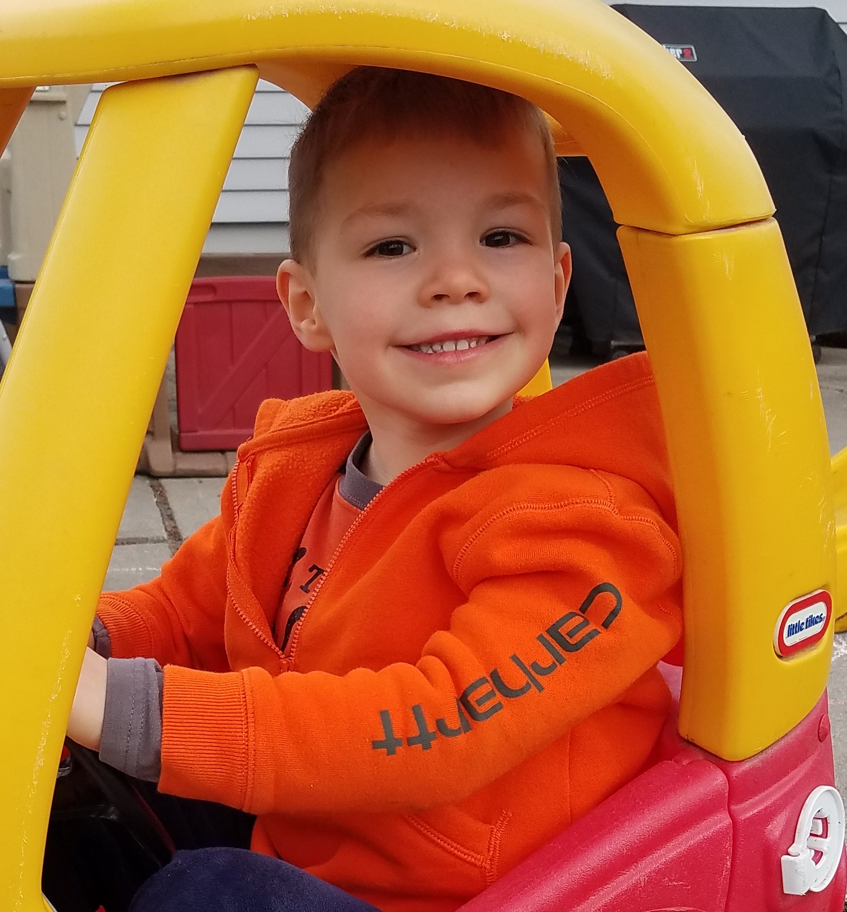 Dominic Walters is shown in a toy car. (Papio NRD)