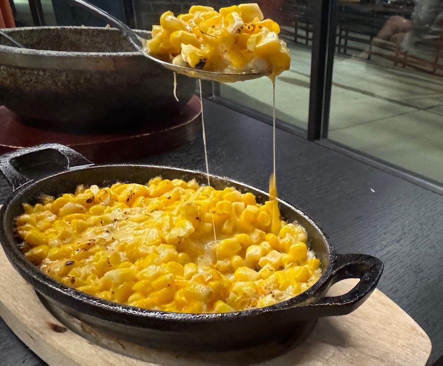 A popular snack in Korean cuisine, corn cheese is a cheesy, creamy, salty treat made with corn, mozzarella, mayonnaise and sugar.<br />(Sarah Baker Hansen / Flatwater Free Press)
