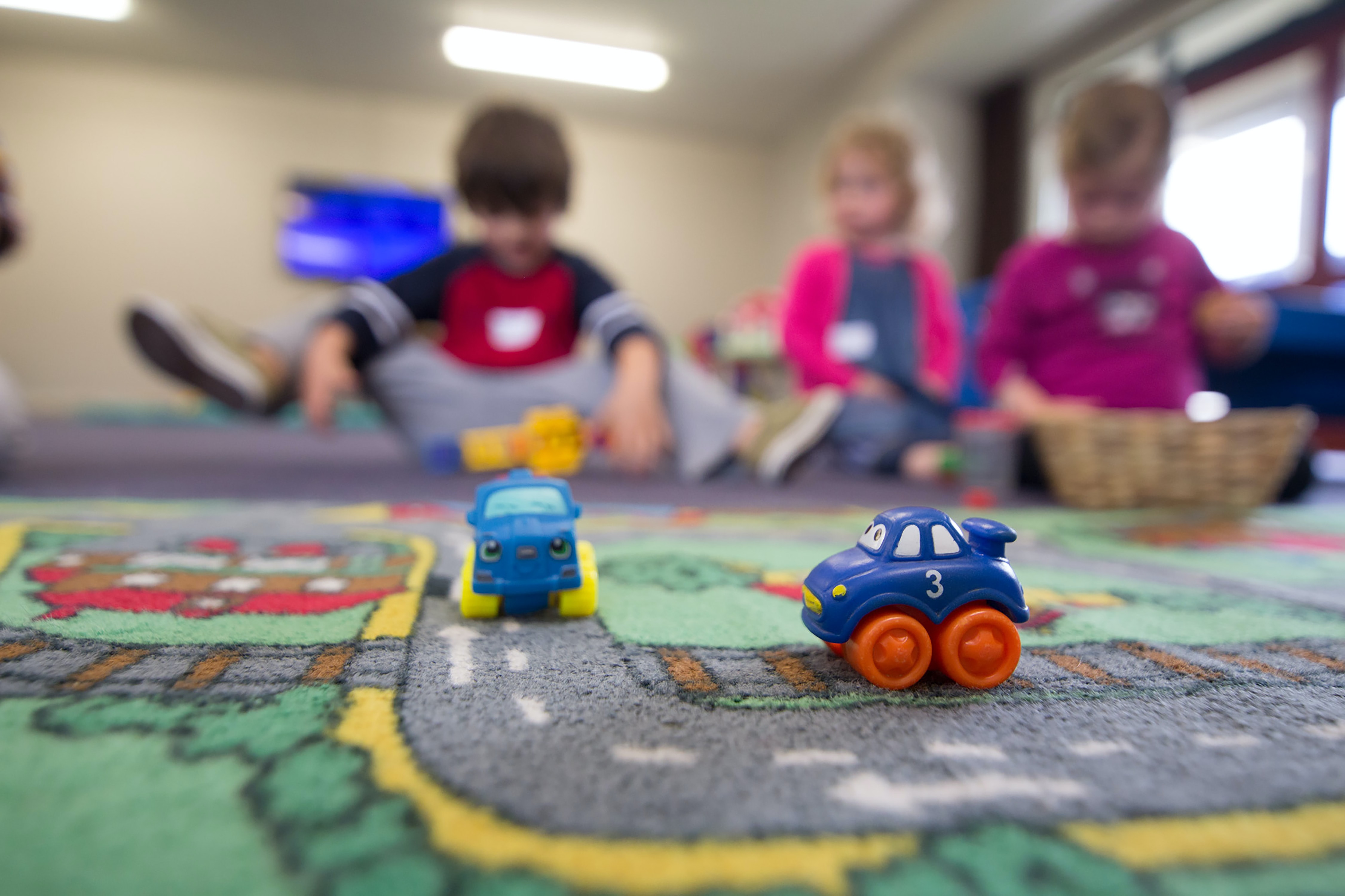 Children play with toy cars. The American Rescue Plan allocated $39 billion for child care in the hopes of creating long-term change in the industry at the direction of state and tribal governments. (BBC Creative via Unsplash)