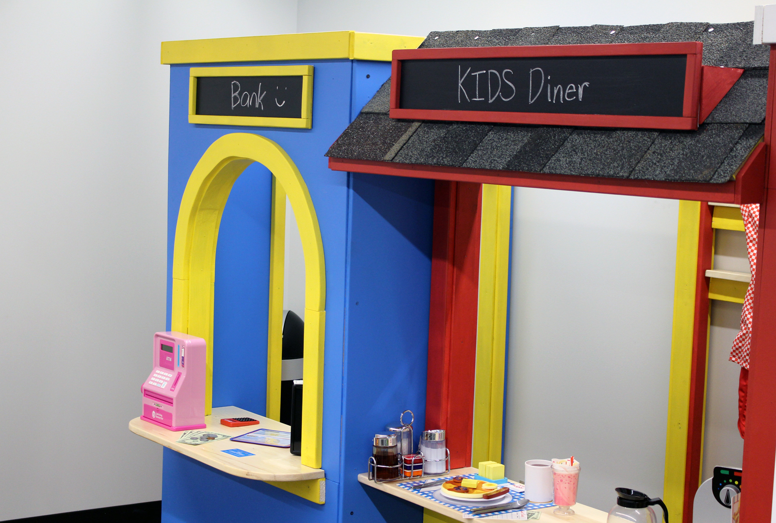 Classroom spaces at the Completely KIDS headquarters, 2566 St. Mary’s Ave., include movable pieces that help young children explore careers and have structured playtime together. (Photo by Scott Stewart)