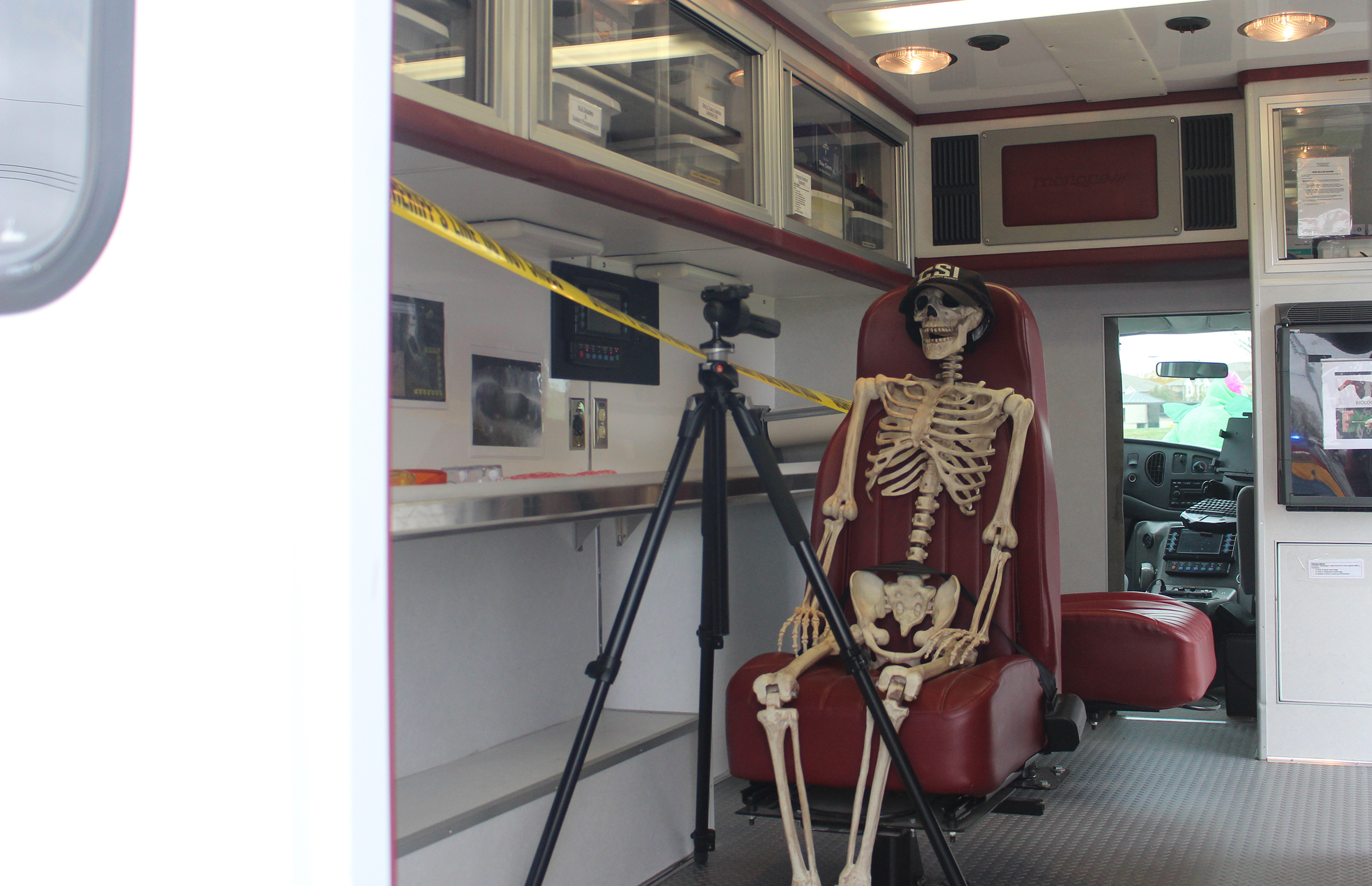 A skeleton crime scene investigator was stationed inside a Douglas County Medical Examiner’s ambulance at the open house on Saturday, Oct. 27, 2019. (Photo by Scott Stewart)