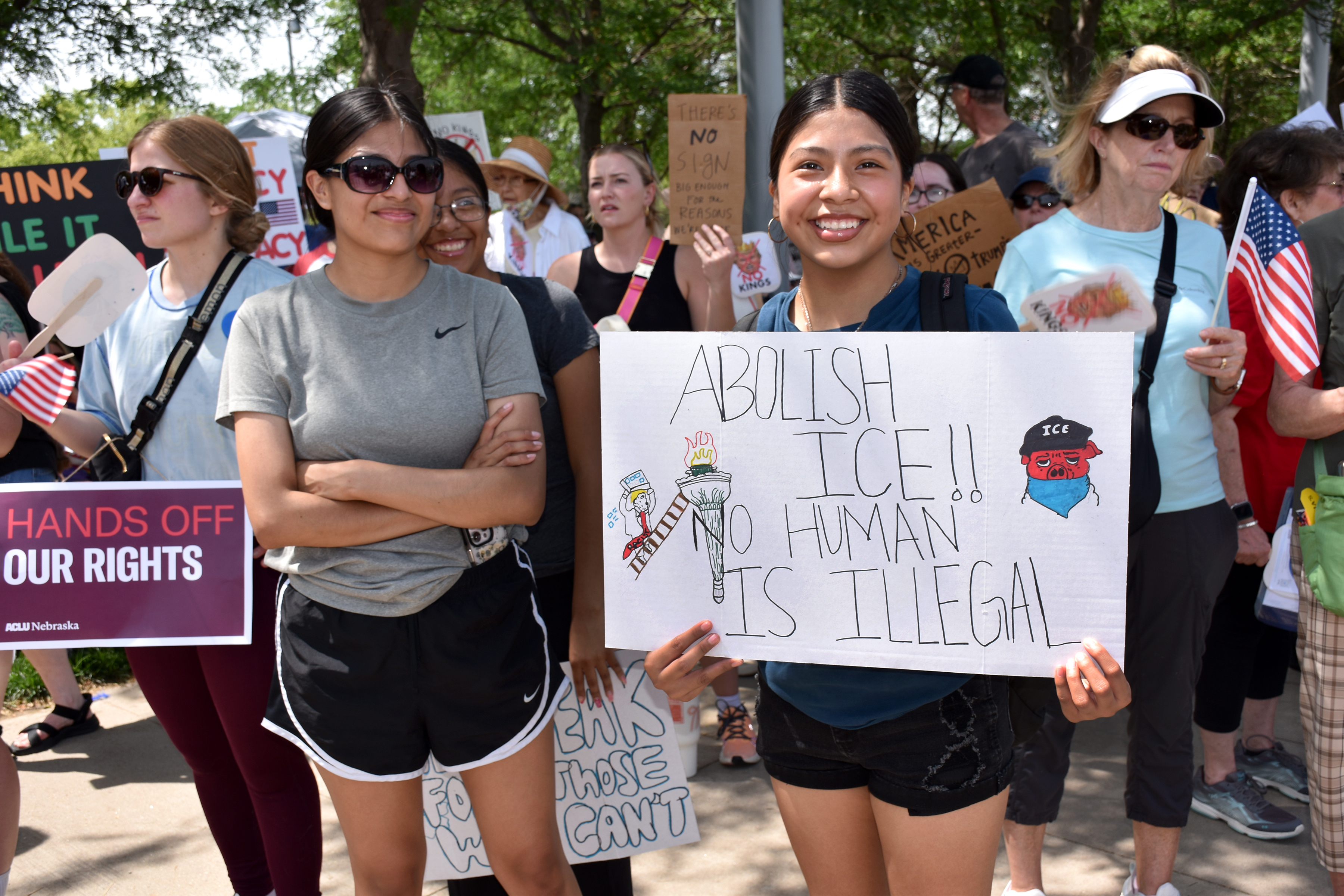 Nebraskas and Iowans protesting for immigrant rights at the “No Kings” rally on June 14, 2025 at Tom Hanafan River’s Edge Park.<br />(Carla Chance / The Daily Record)