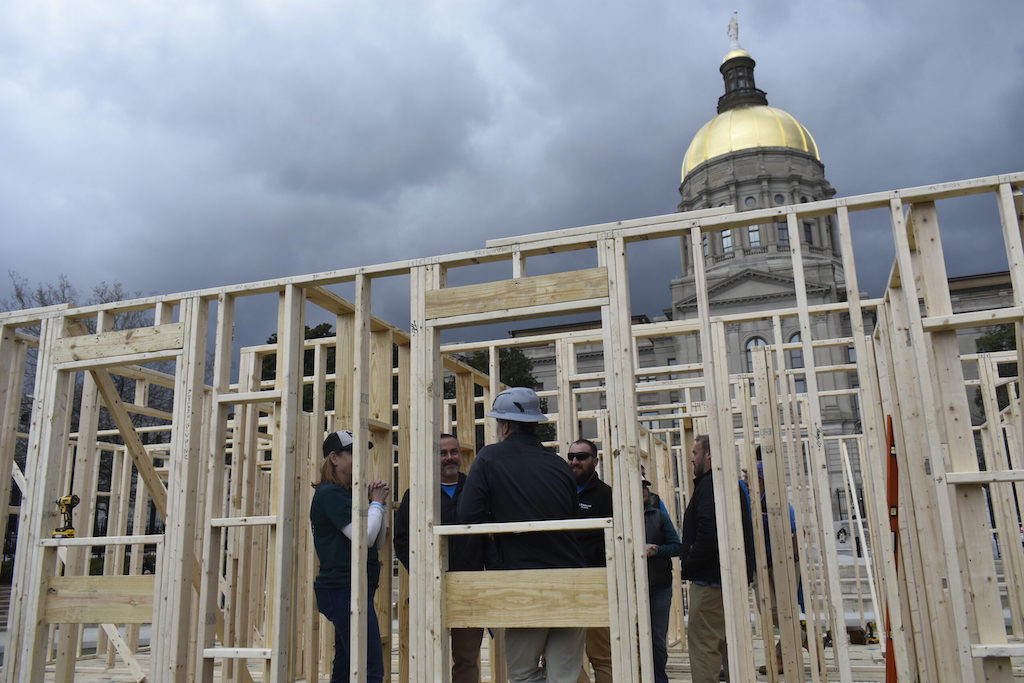A coalition of Georgia housing rights organizations build a makeshift home outside the state Capitol in March to promote a tax credit bill that would save money on home construction expenses for nonprofits. Mayors across the country say the housing crisis has become one of their most important challenges.<br />(Ross Williams / Georgia Recorder)