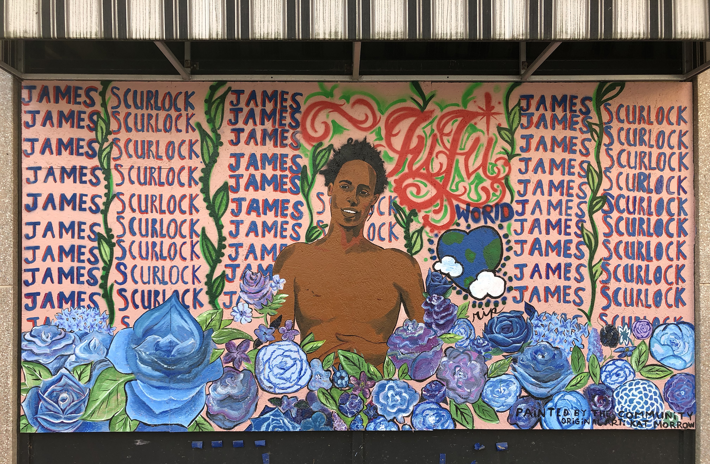 A mural painted on a boarded-up window of Culprit Cafe at 16th and Farnam streets in Omaha shows an illustration by Kat Morrow depicting James Scurlock surrounded by flowers and his name, Wednesday, Sept. 16, 2020. (Scott Stewart/Daily Record)