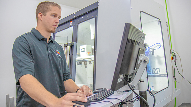 Jim Higgins, chief engineer and Nebraska alumnus, works on a drone system prototype. The company has also hired University of Nebraska-Lincoln undergraduate students to work as interns. (Courtesy Alyssa Amen/NUtech Ventures/UNL)