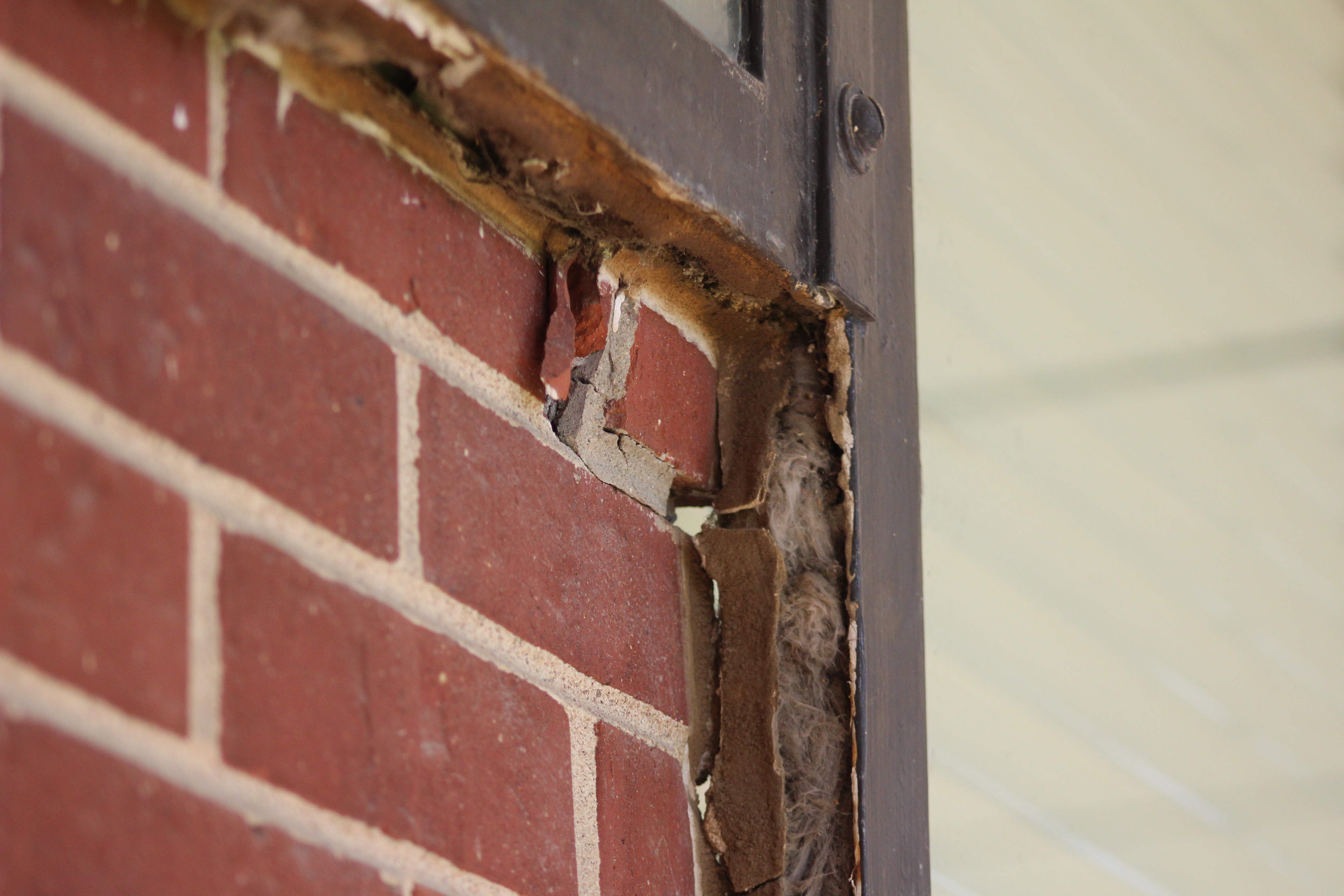 A closeup of the exterior of Mockingbird Elementary showing crumbling brick is shown on Tuesday, July 13, 2021. (Derek Noehren/The Daily Record)