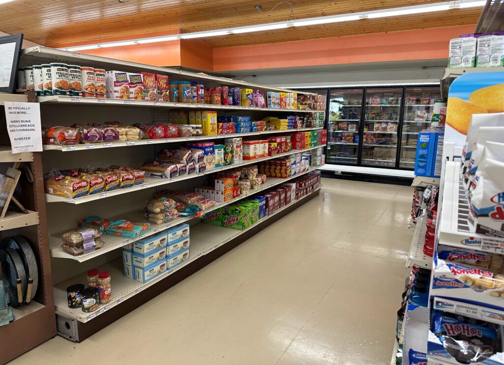 Shelves stocked with groceries inside the Circle C Market in Cody. Across rural Nebraska, independent grocery stores like Circle C are struggling to stay open.<br />(Heidi Beguin / Flatwater Free Press)