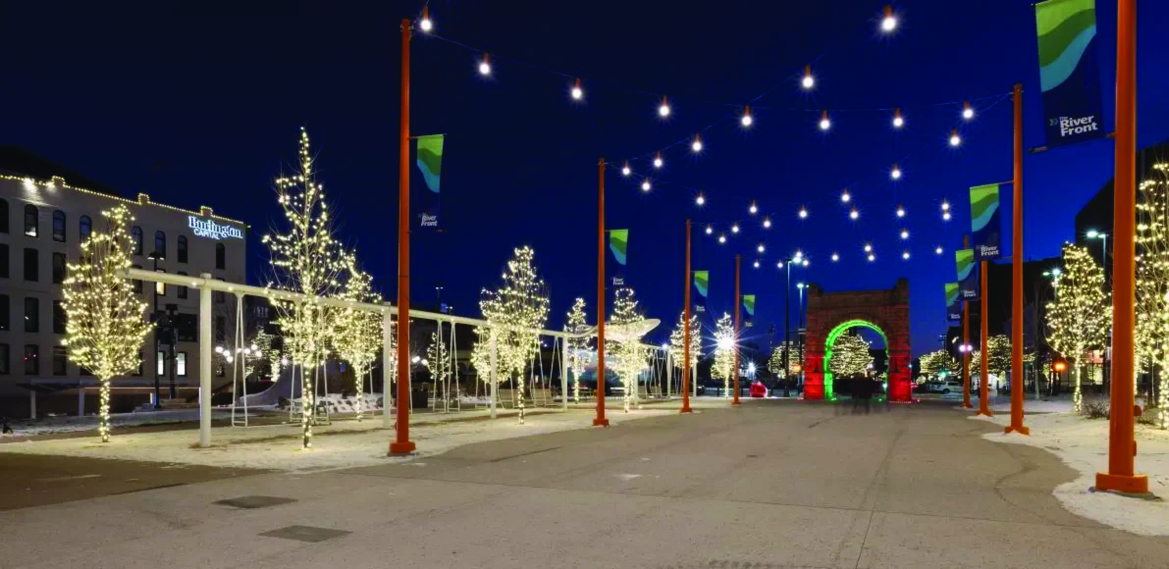 Omaha’s Holiday Lights Festival illuminates 72 acres of The Riverfront parks system along with Old Market and main corridors of South and North Omaha. Shown here are previous holiday seasons at The Riverfront’s Gene Leahy Mall.<br />(Courtesy of Holiday Lights Festival)